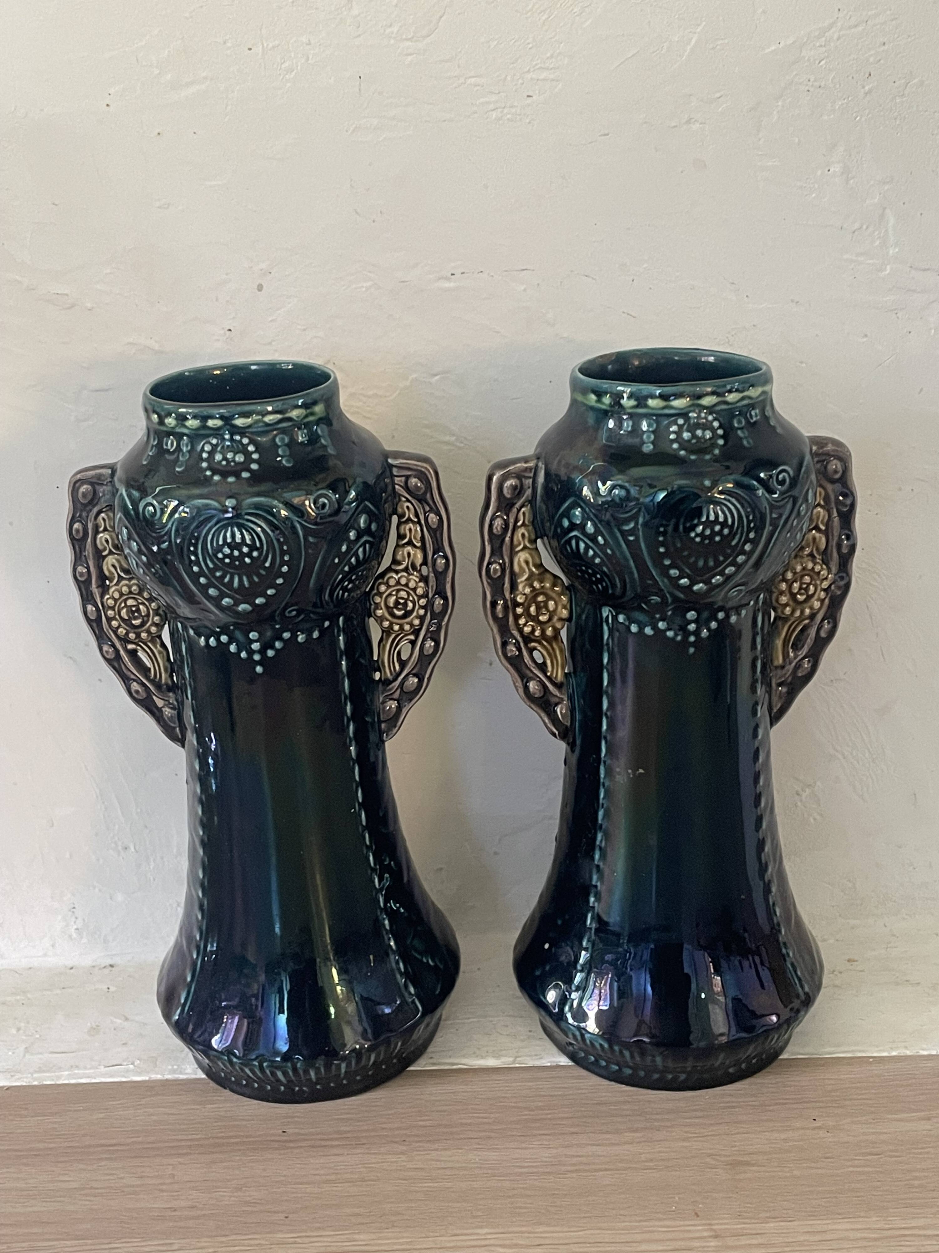 Pair of Art Nouveau slipware vases, hand-painted decoration.