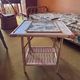 Vintage bedside table in bamboo and rattan with decorative top.