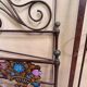 Venetian bed in iron and cast iron from the Art Nouveau period with polychrome decorations