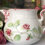 Old white and pink teapot