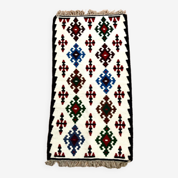 Small ethnic carpet