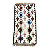 Small ethnic carpet