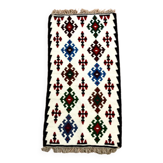 Small ethnic carpet