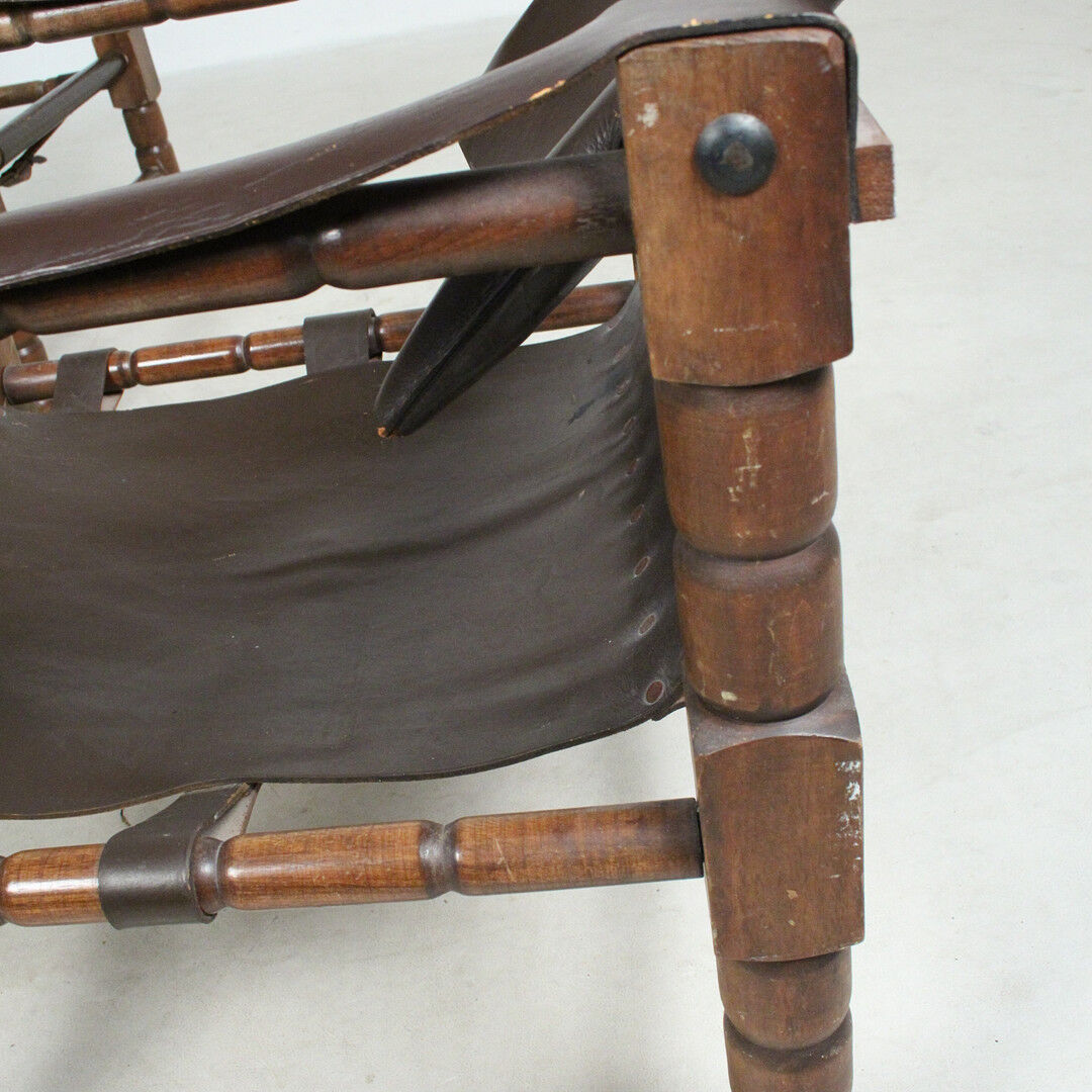 Pairs of vintage Safari style armchairs in wood and leather