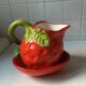 Strawberry-shaped pitcher with a dish