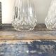 Set of two electrified chiseled glass sconces to nine