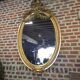 Oval mirror in Louis XV style, large model.
