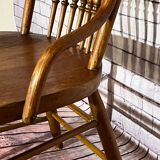Wooden armchair with high back