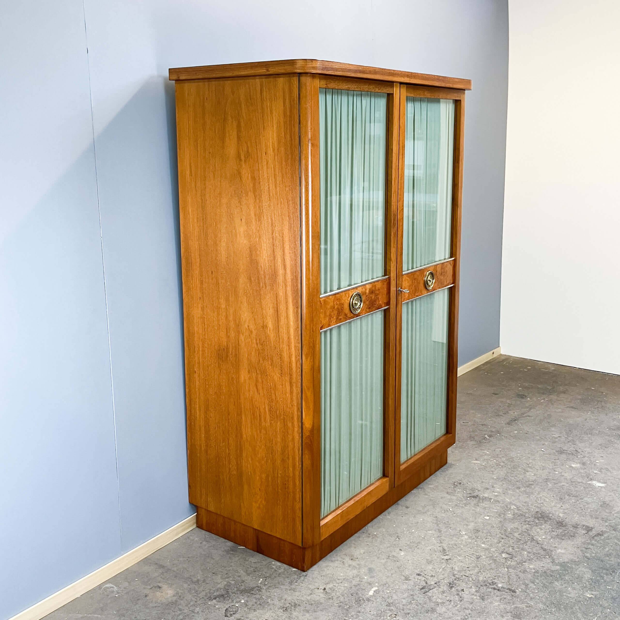 Art Deco cabinet with glass doors, various woods, 1930s