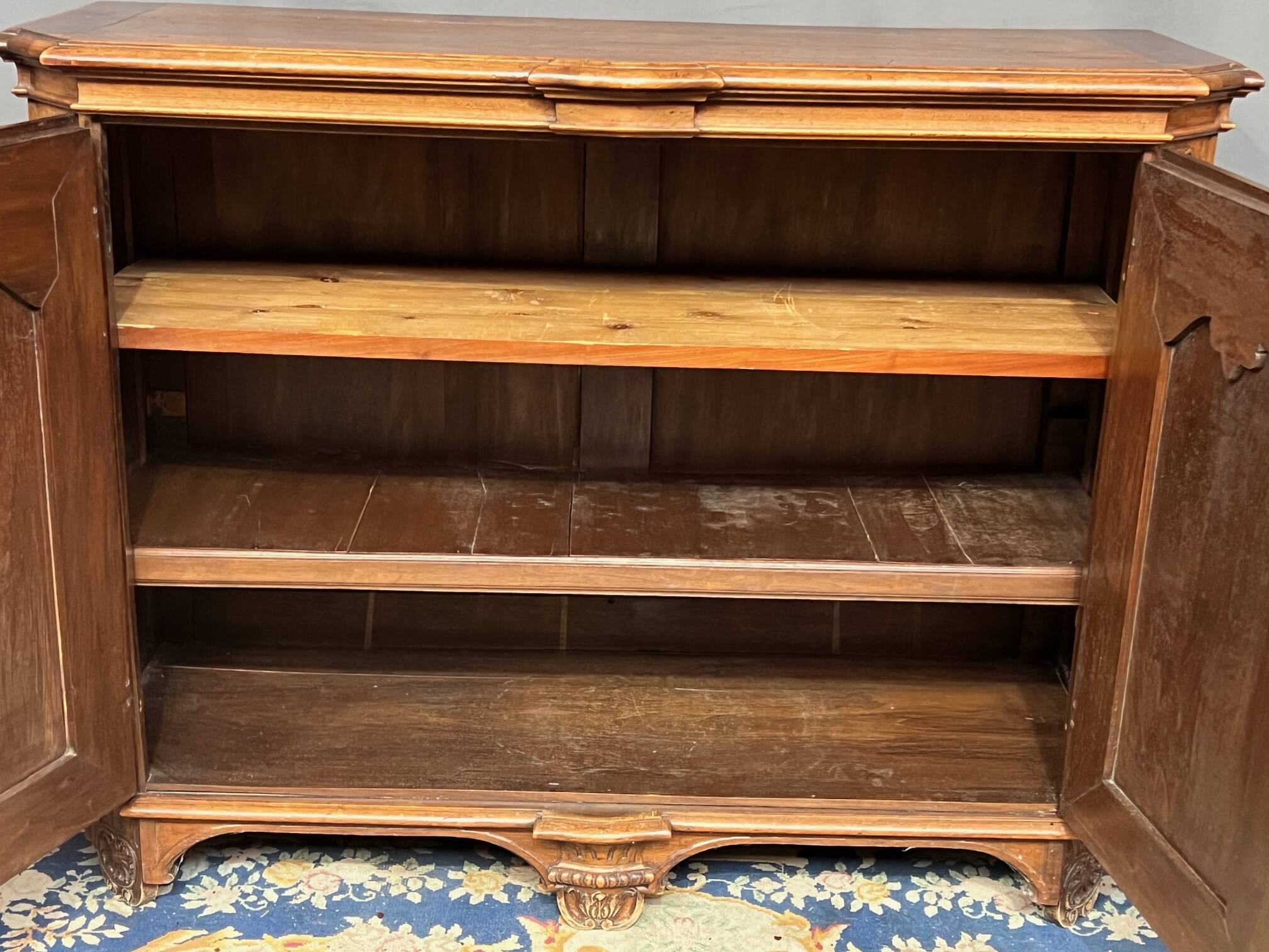 Louis XV style carved walnut chest of drawers