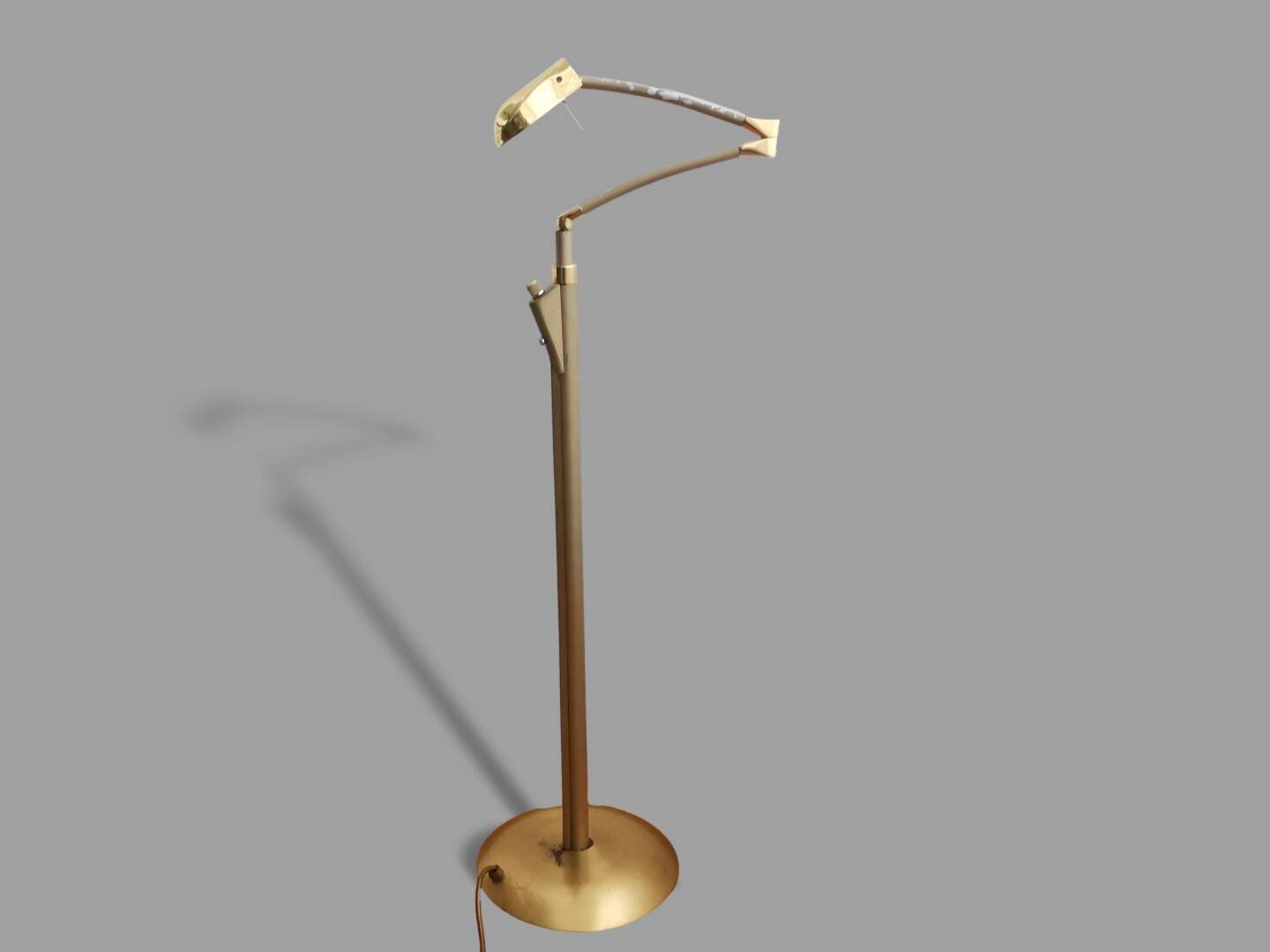 Adjustable swing arm modernist floor lamp