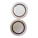 Salins white ceramic dessert plates with red trim and gold rim.