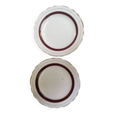 Salins white ceramic dessert plates with red trim and gold rim.
