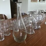 Glassware set with carafes, pitcher and bottle coasters