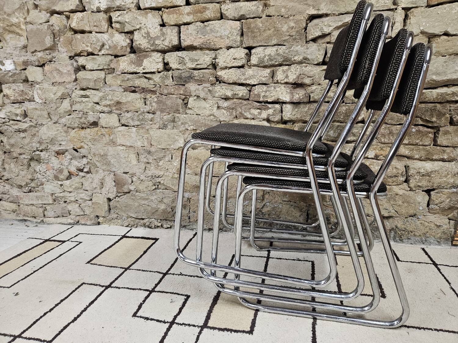 Set of four vintage 1970 sled chairs