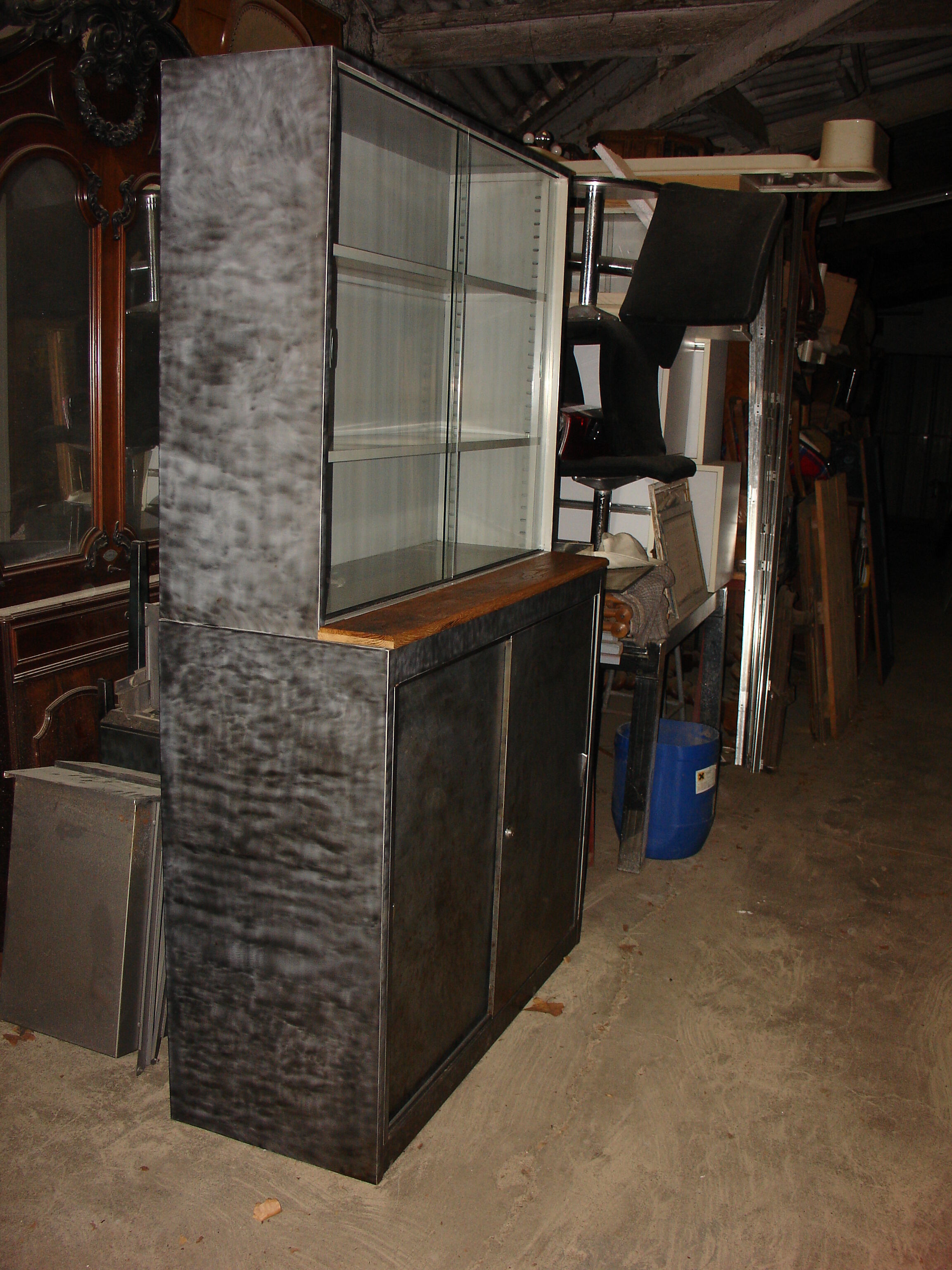 Buffet or Bookcase 2 bodies in polished and varnished steel circa 1960