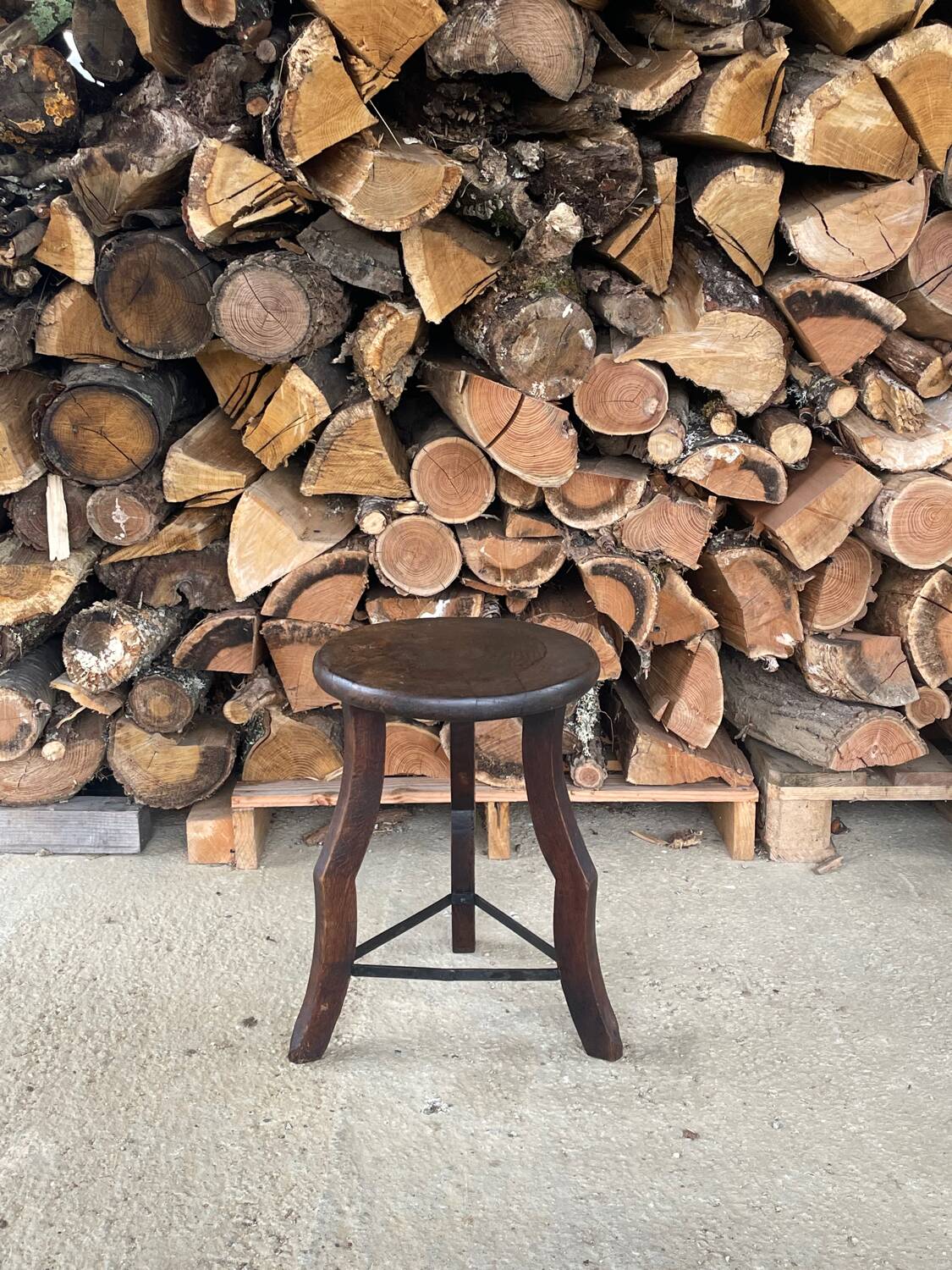 Wooden tripod stool