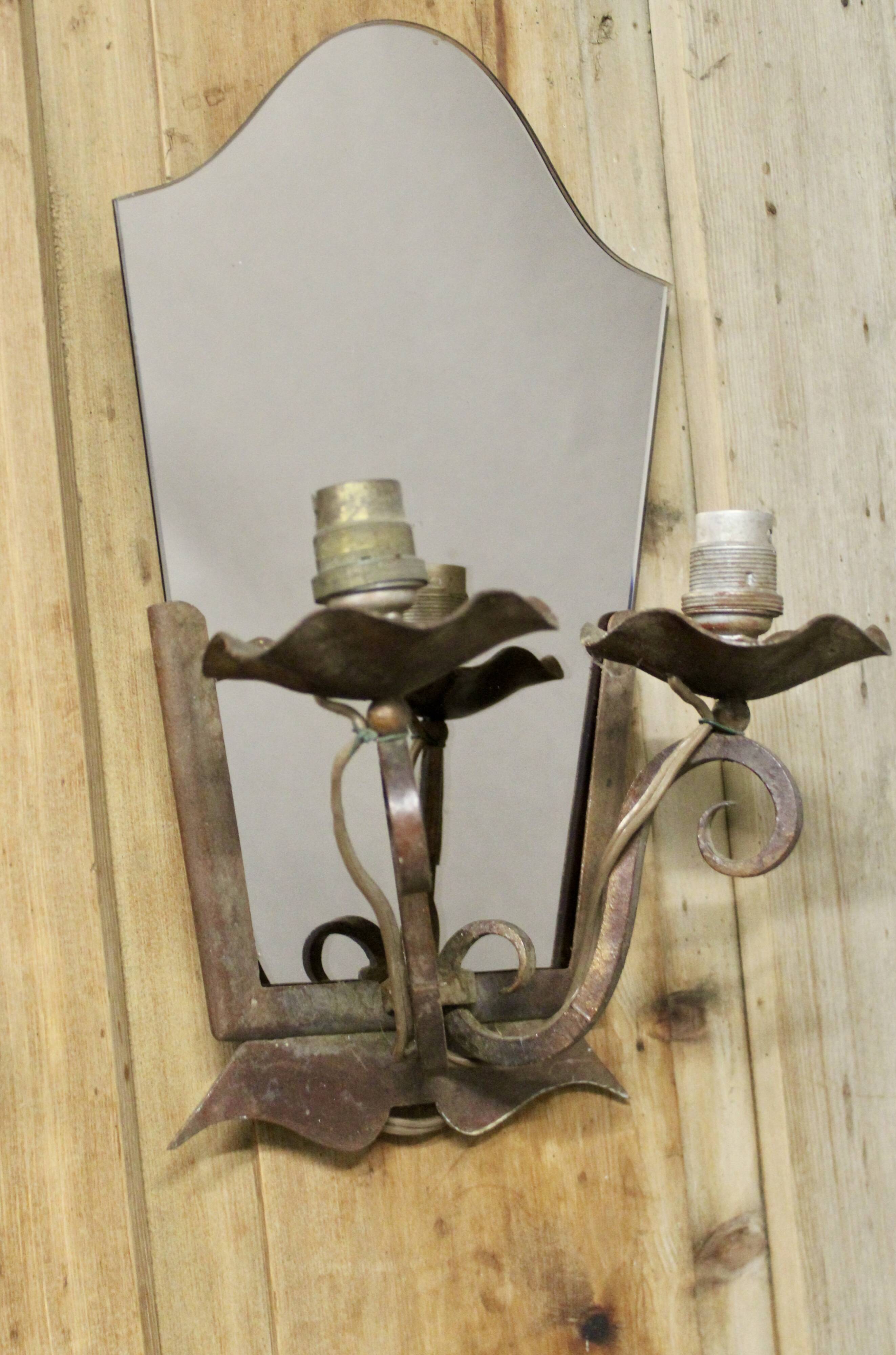 Pair of Art Deco wrought iron and smoked glass wall lights