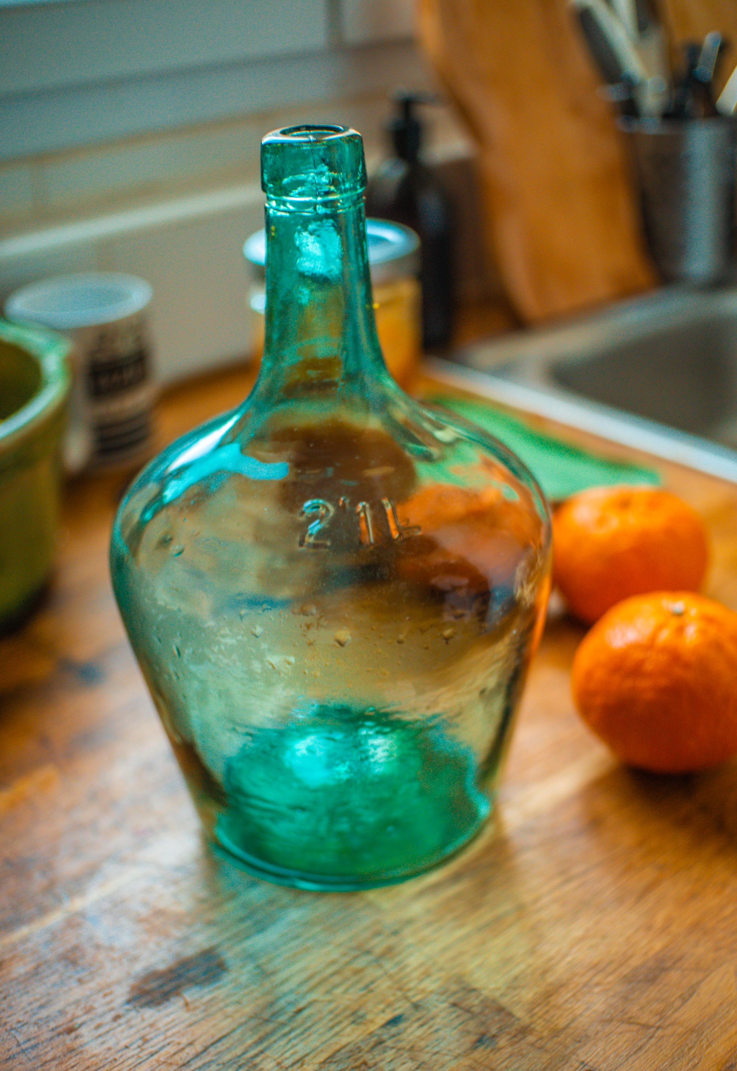 Dame Jeanne with her wicker case