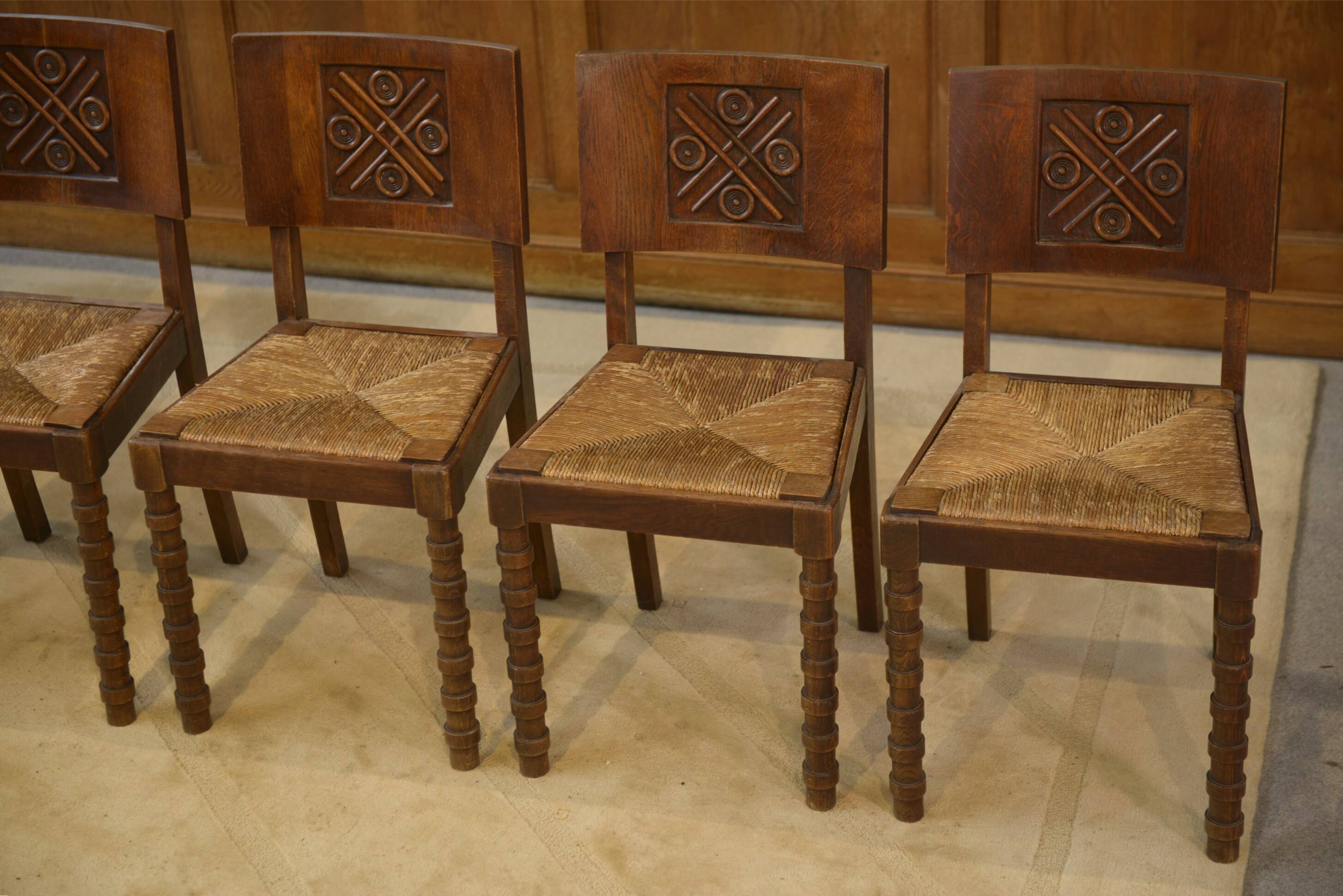 Ensemble de 6 chaises Charles Dudouyt en chêne 1950’s