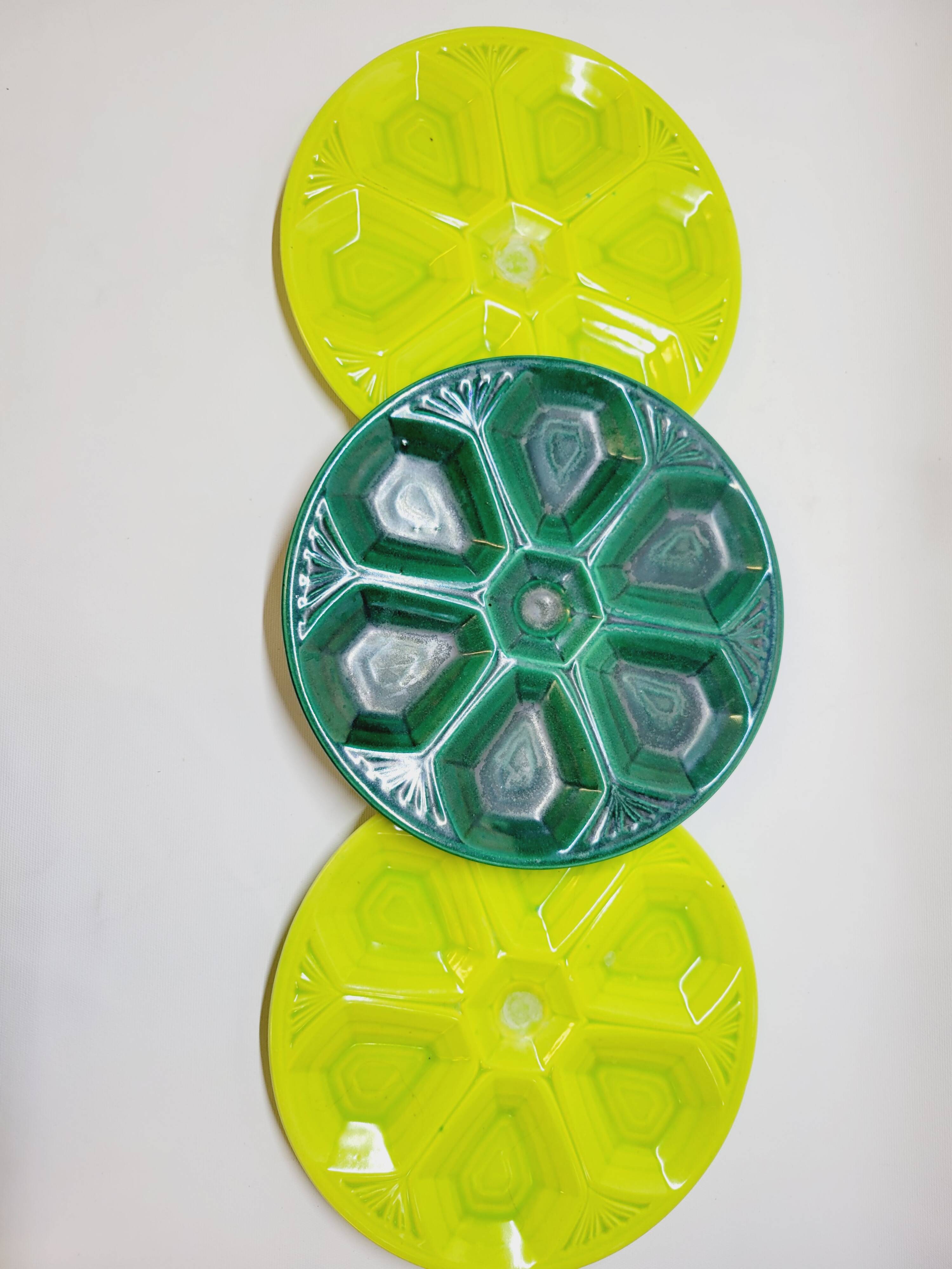 3 art deco oyster plates with green geometric decor
