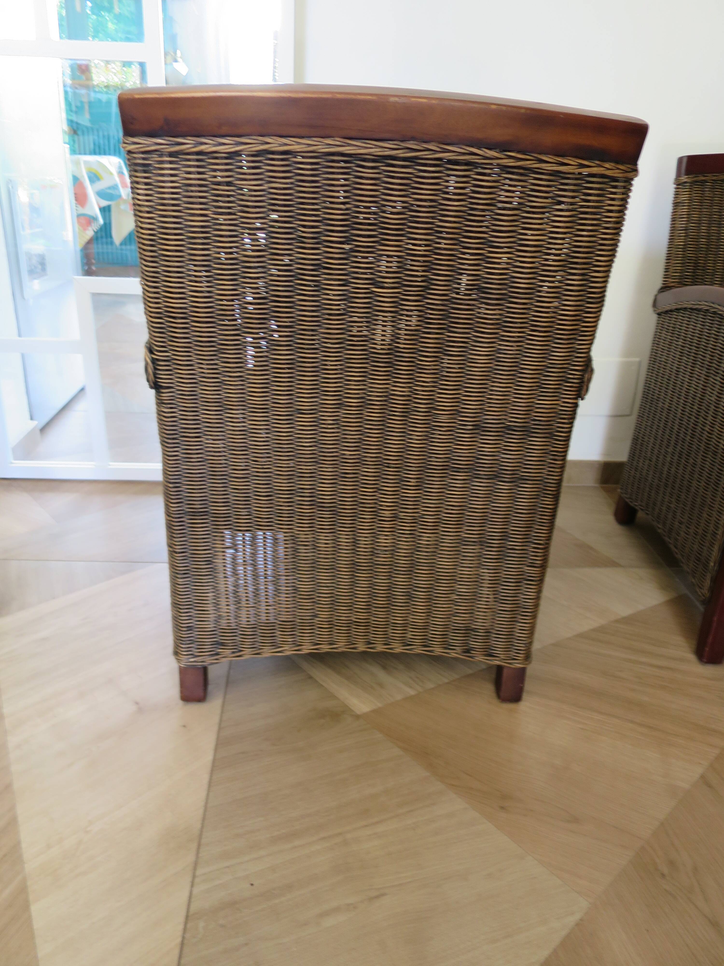 2 armchairs in woven rattan and wood, 1980s