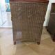 2 armchairs in woven rattan and wood, 1980s