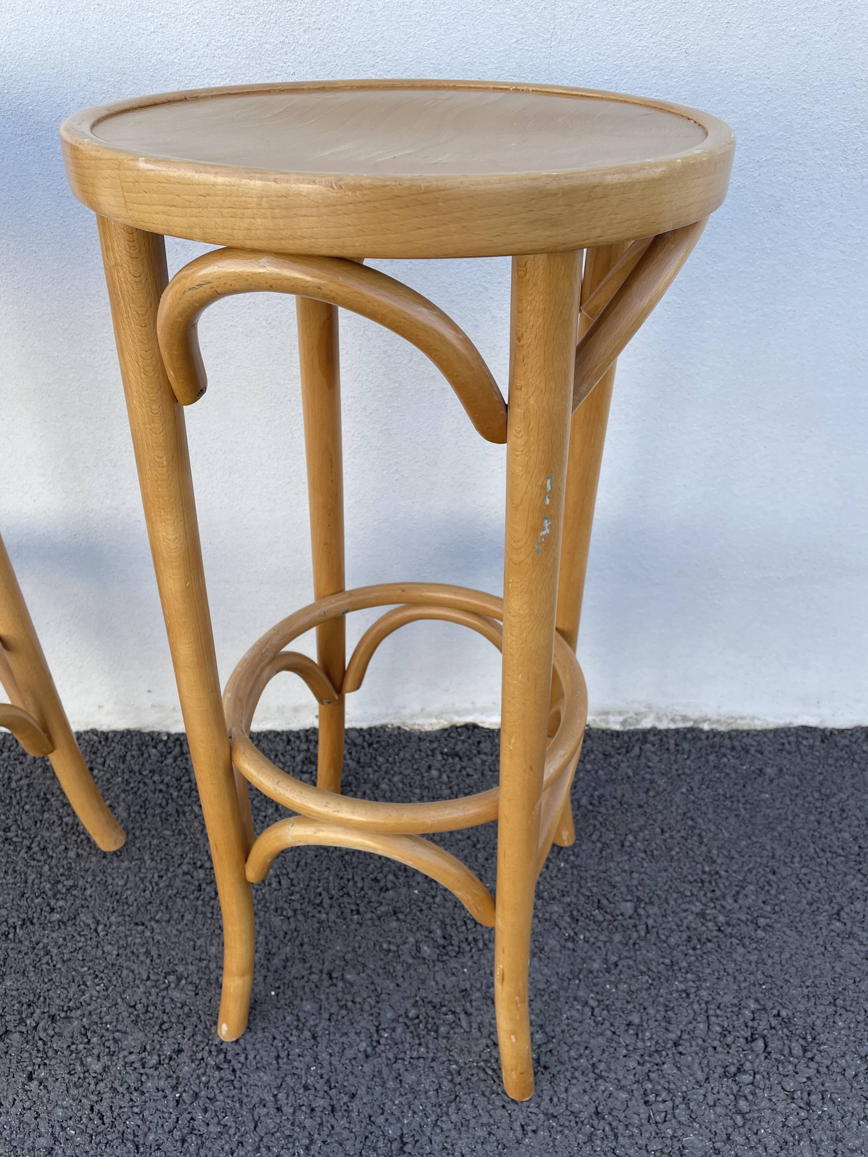 Curved wooden bar stool