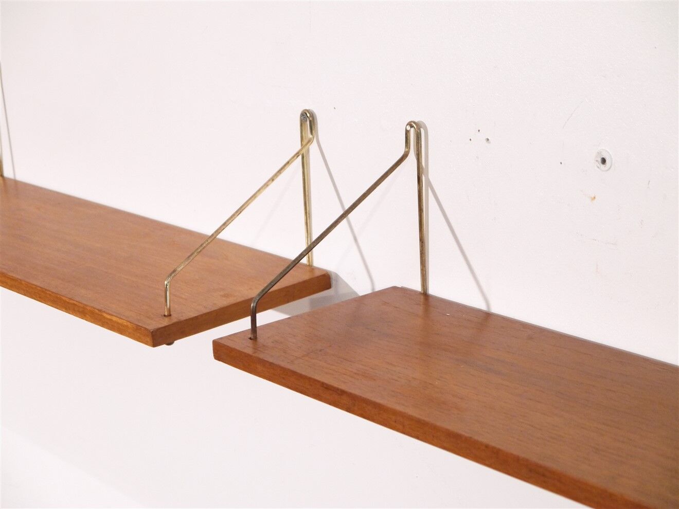 Pair of Danish teak and brass shelves 1960