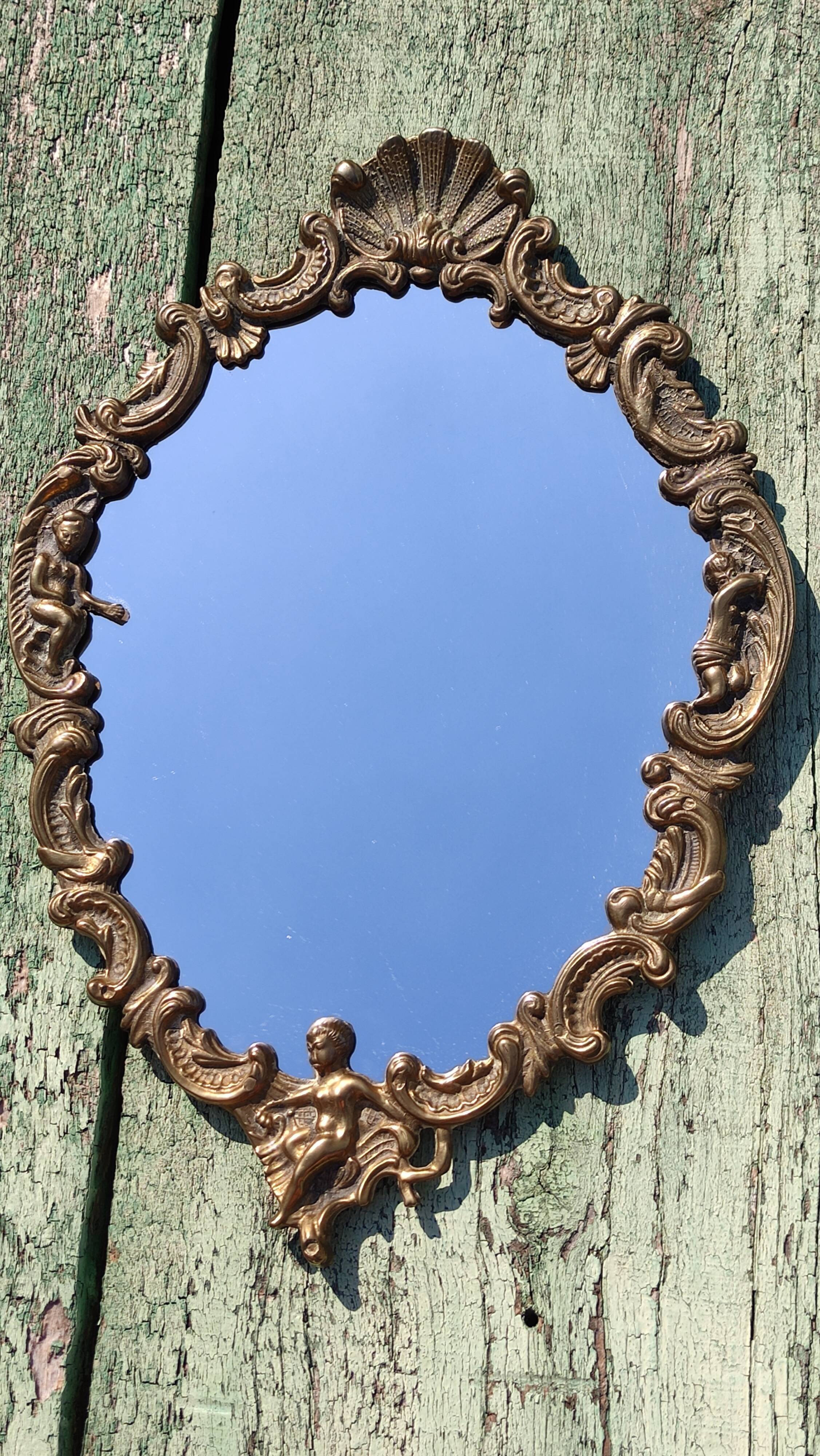 Vintage mirror in solid golden brass