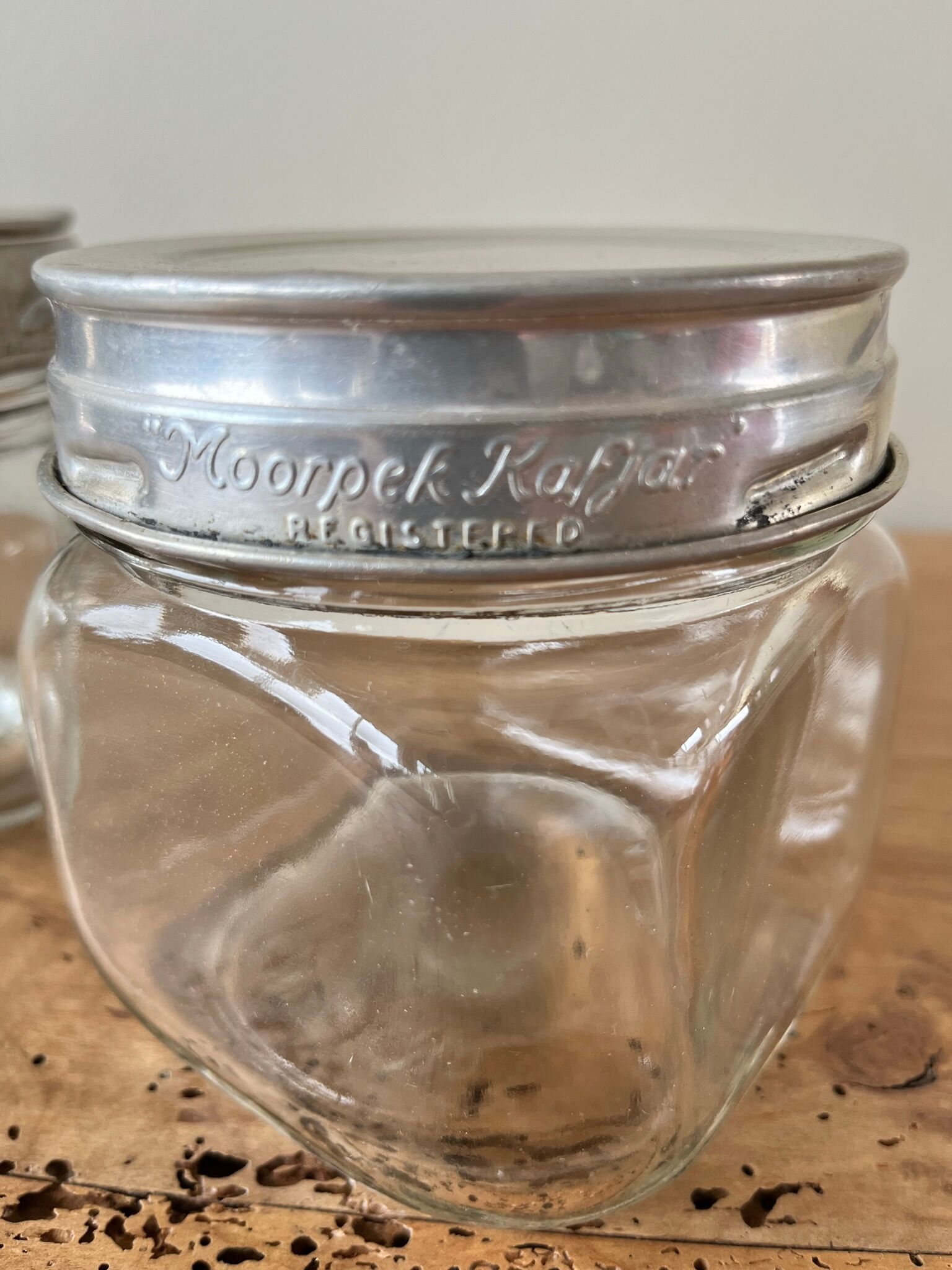 Set of 2 antique jars with aluminum lids