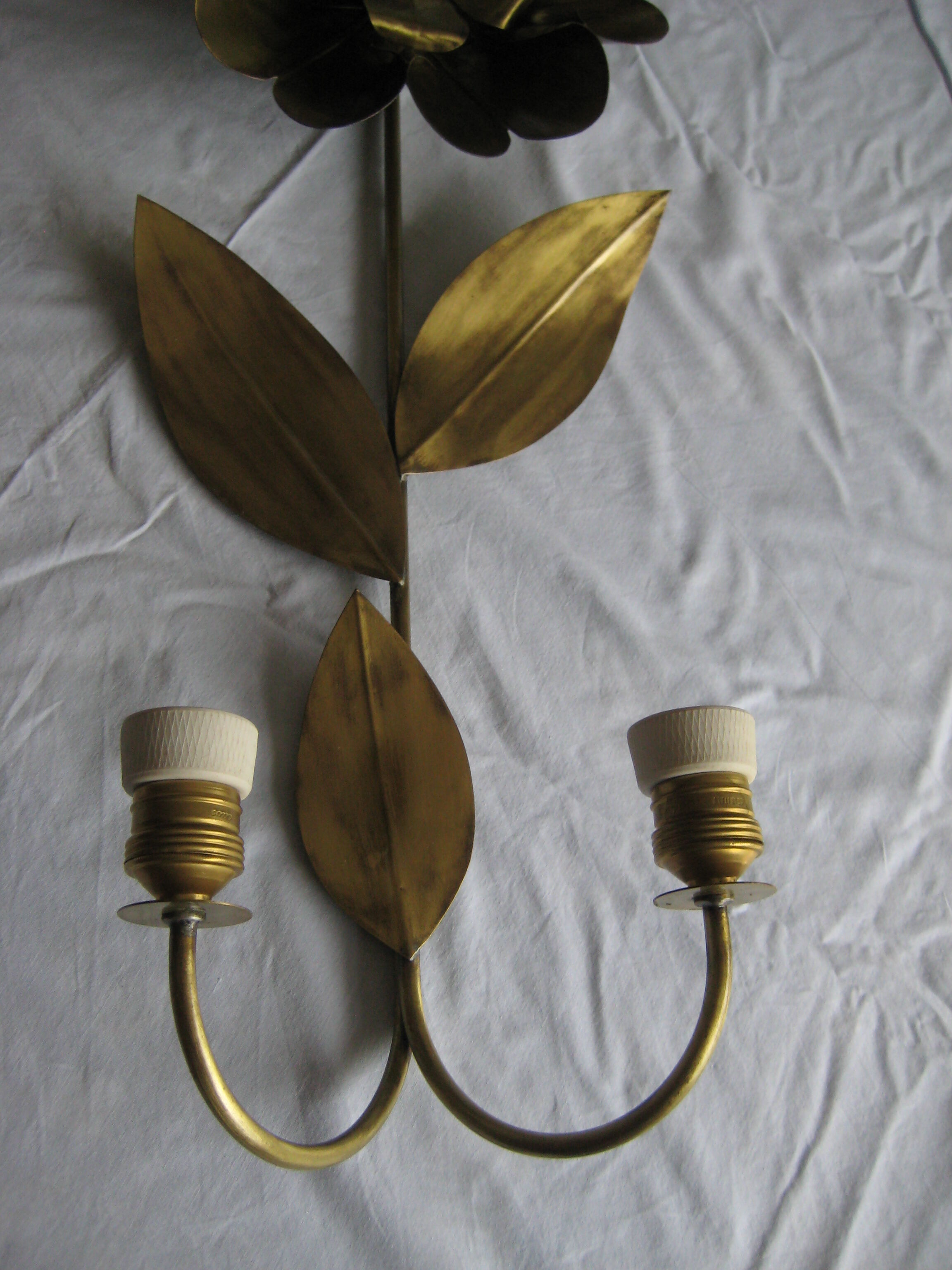 Brass sunflower sconces