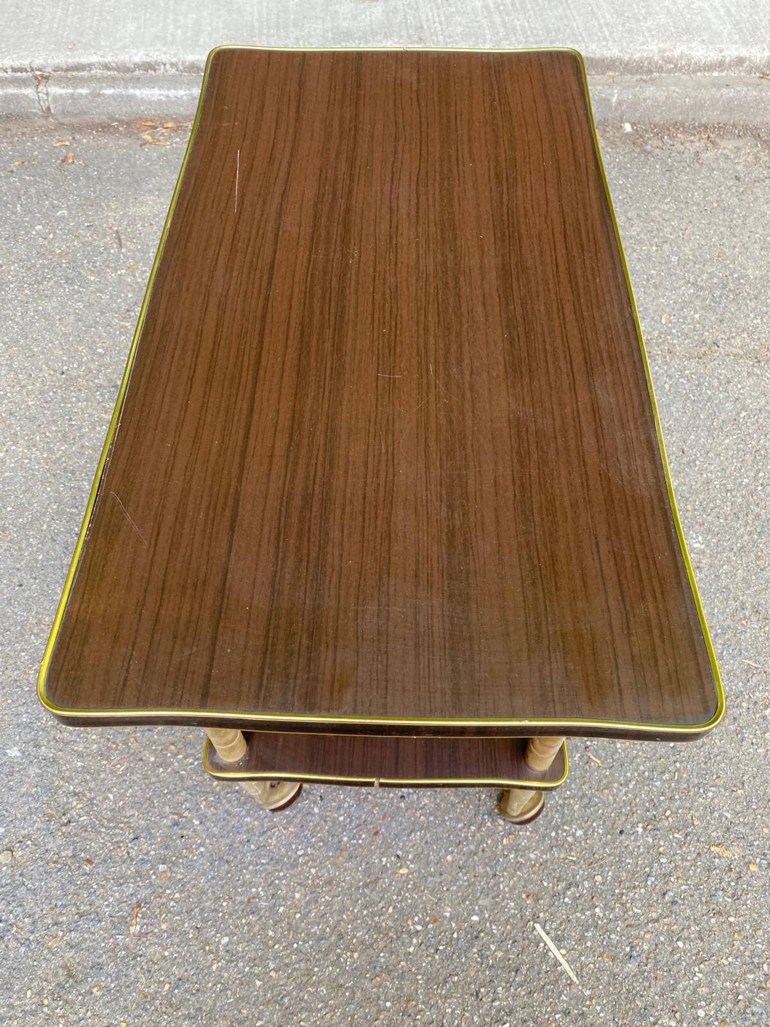 Double-tray rosewood serving trolley on gilded casters, 1970