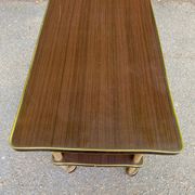 Double-tray rosewood serving trolley on gilded casters, 1970
