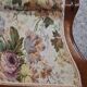 Louis XV style armchair with floral jacquard upholstery.