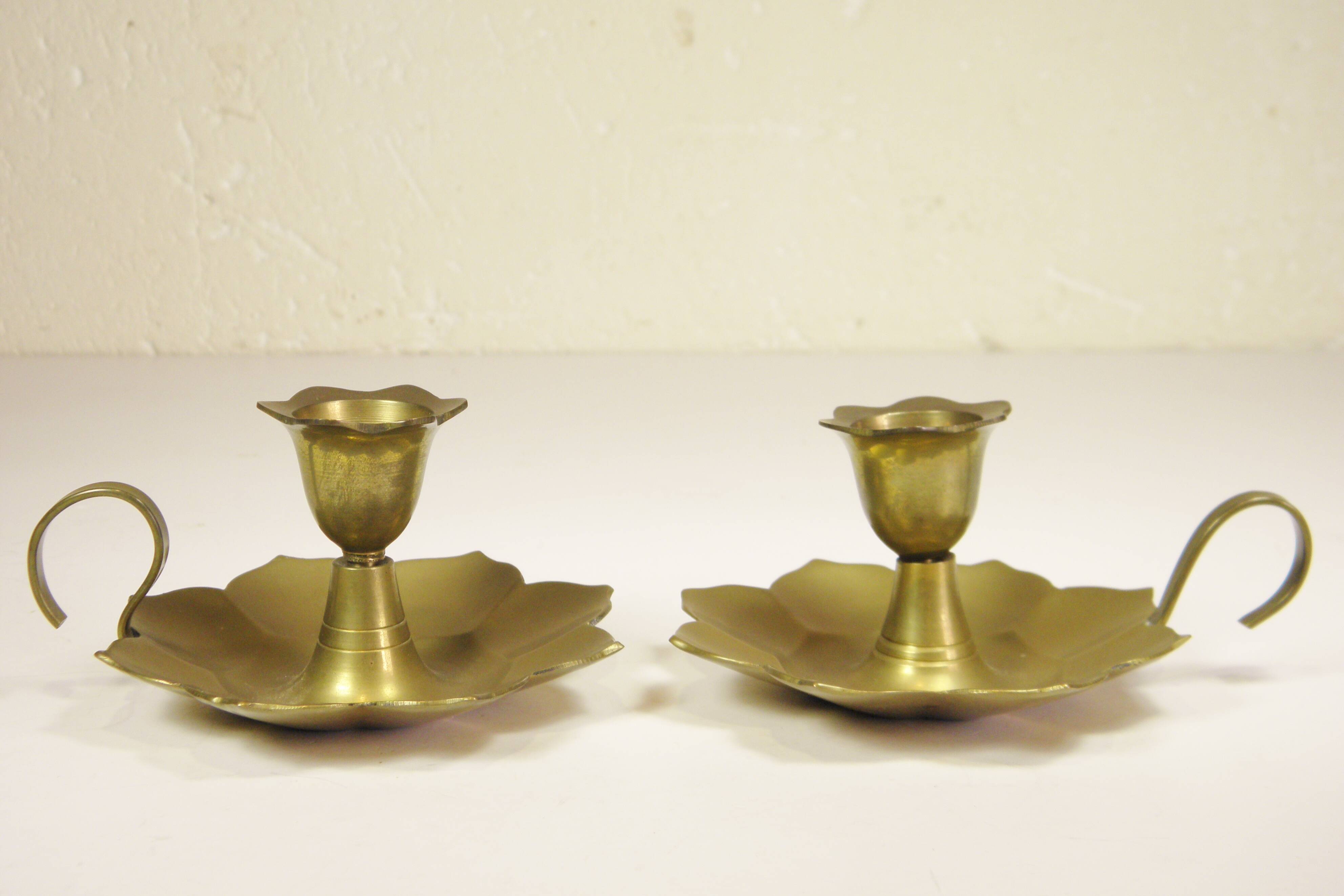Pair of brass "flower" candlesticks