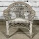 Vintage white rattan armchair