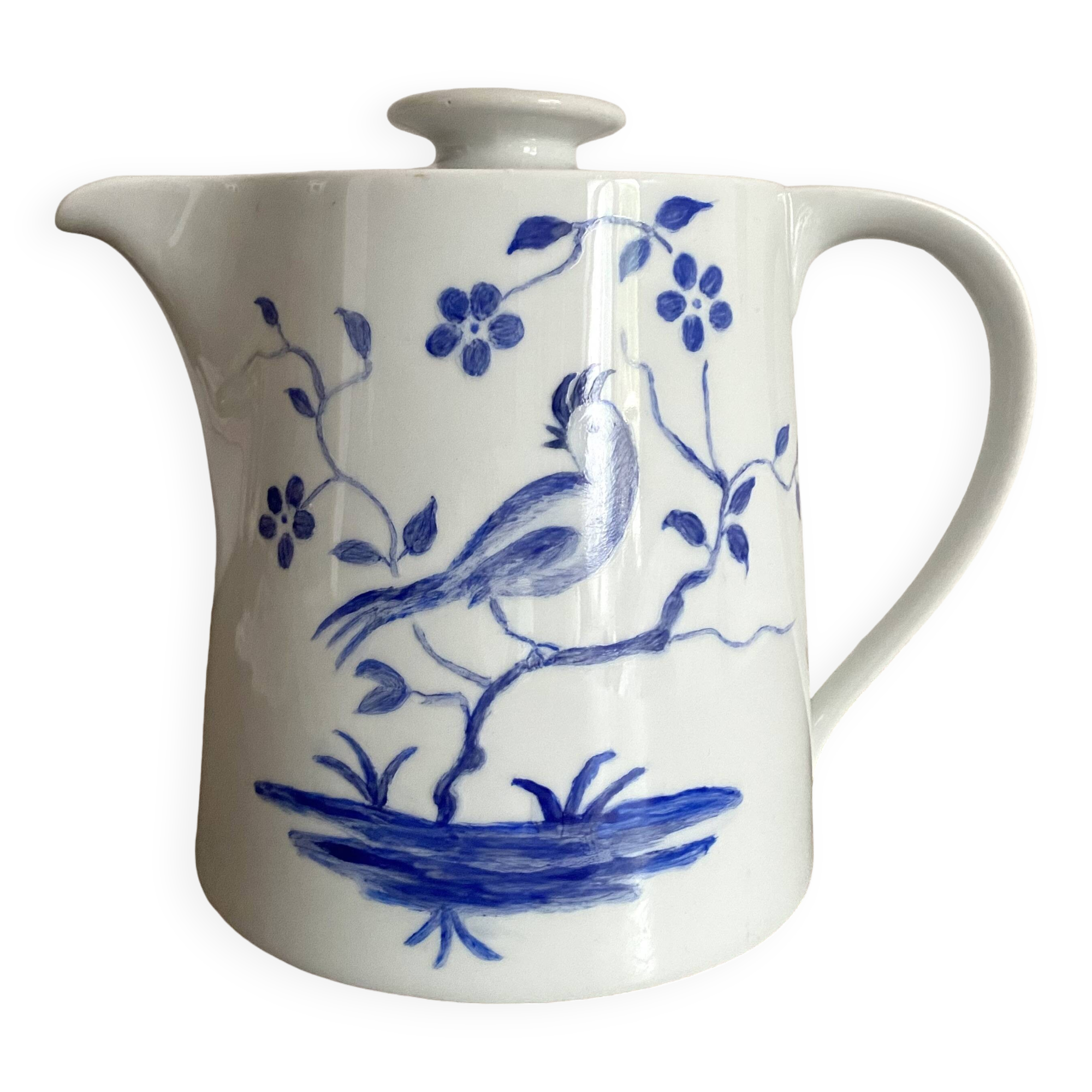 Porcelain teapot with hand-painted bird decoration