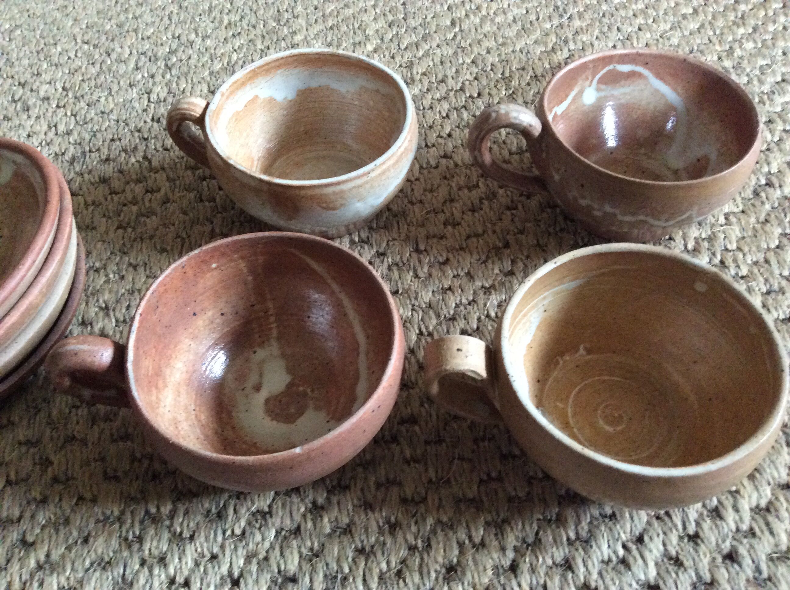 Series of 4 stoneware coffee cups