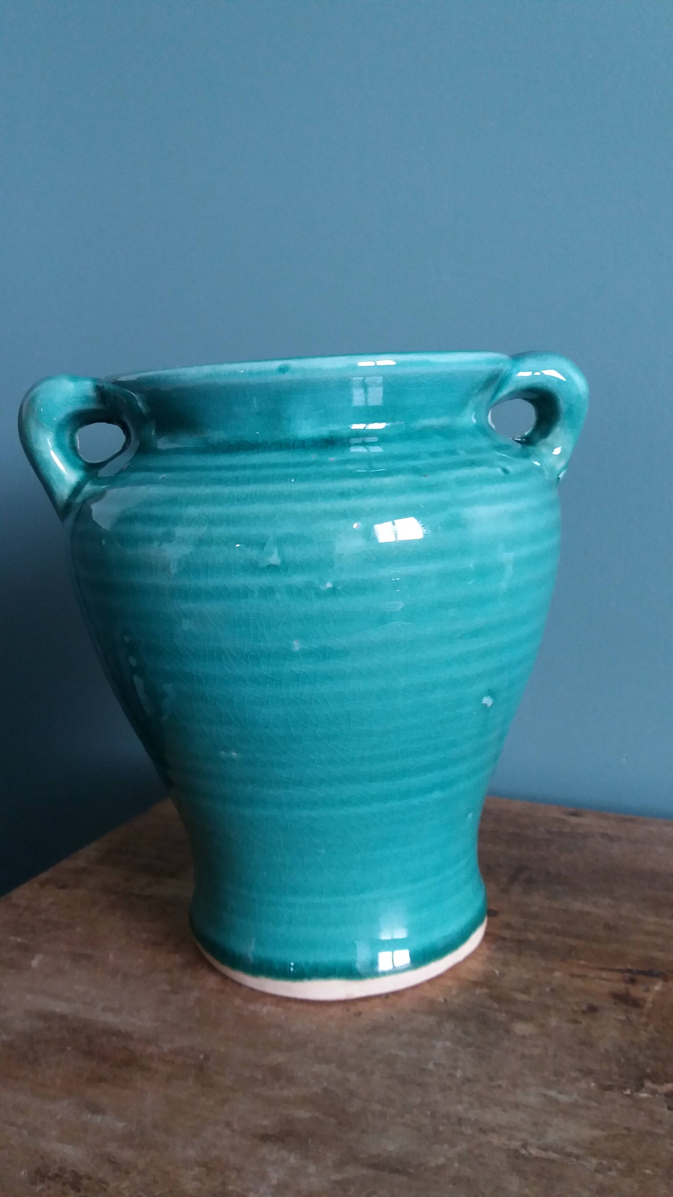 Glazed green-blue ceramic vase