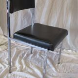 Modernist chair in chromed metal and black imitation leather