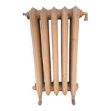 Radiateur ancien sur pieds a cinq lames fleuries en fonte de fer XX siècle