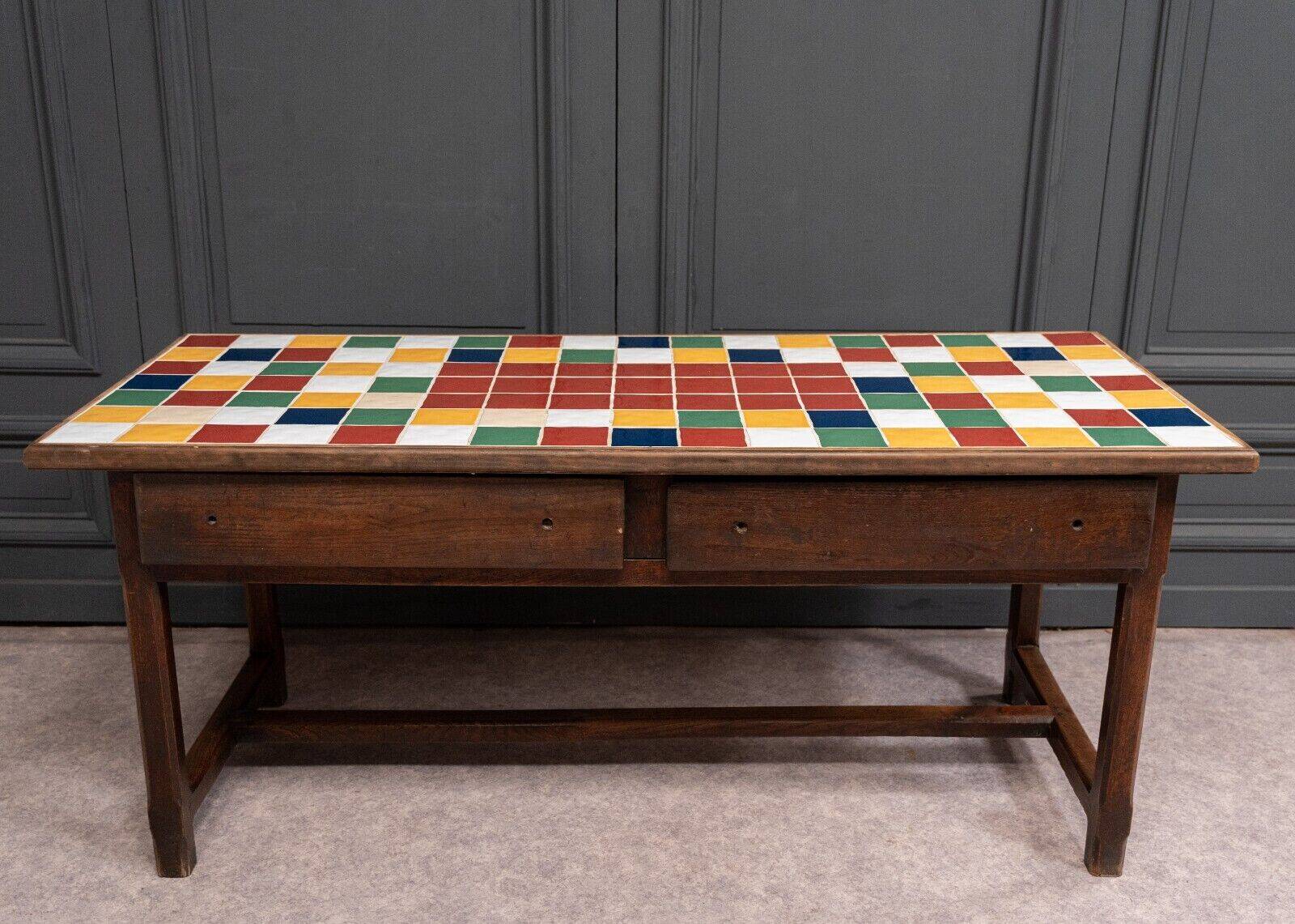 19th century oak farm table with multi-colored ceramic tiles
