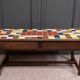 19th century oak farm table with multi-colored ceramic tiles