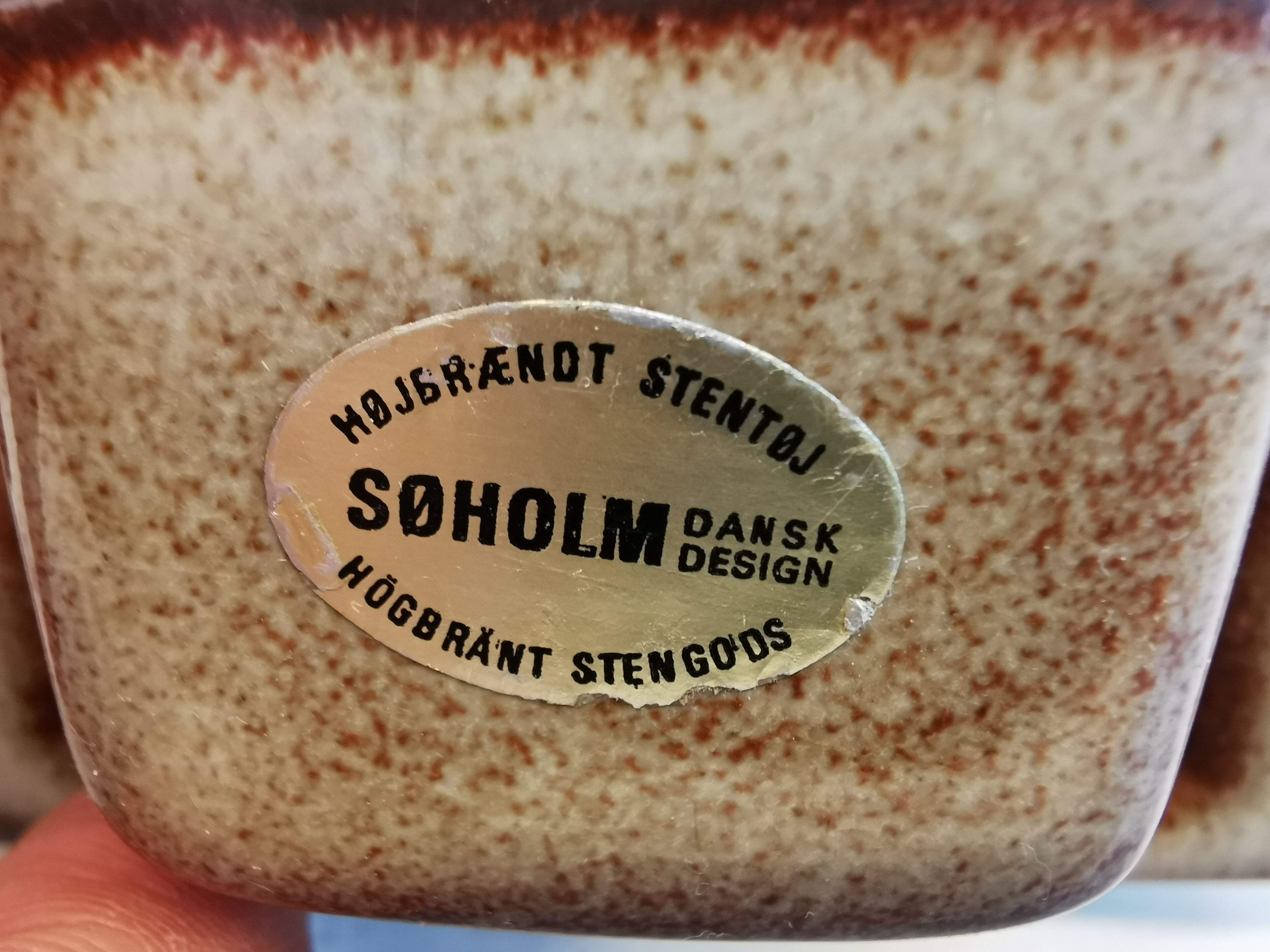Wall-hung candle holder in ceramic, from Danske Søholm, estimated 1960s.