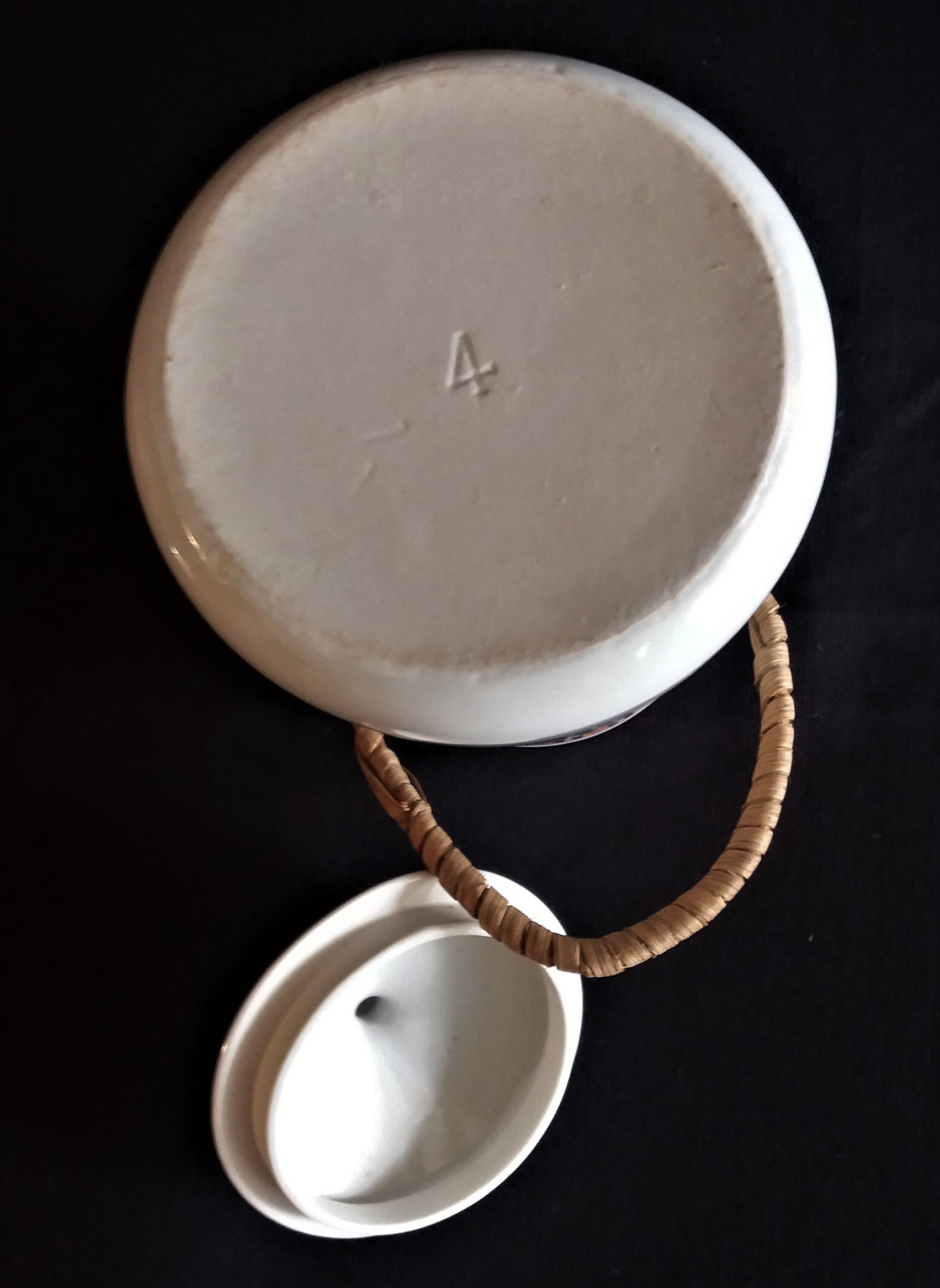 Vintage porcelain milk pot rattan handle