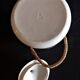 Vintage porcelain milk pot rattan handle