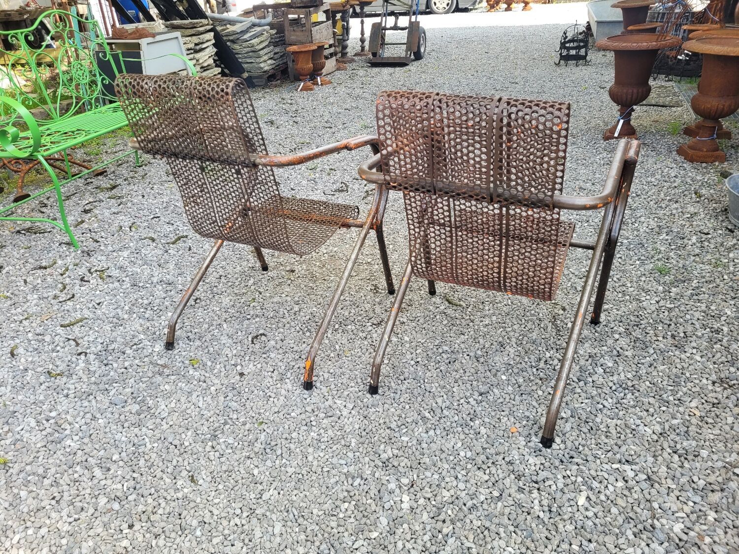 Paire de fauteuils en métal perforé de René Malaval 1950