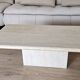 Beige travertine coffee table in the style of Italian design, 120 x 60 cm.