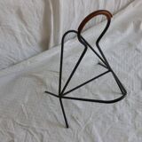 Leather-covered metal magazine holder
